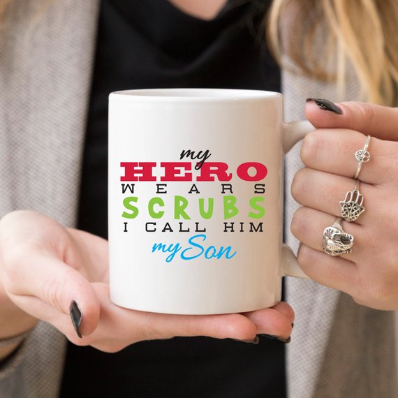 Funny Nurse Mug - My Hero Wears Scrubs, I Call Him My Son